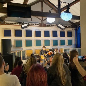 Student band performing at Open Mic Night